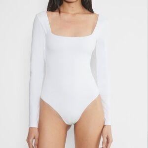 White long sleeve bodysuit